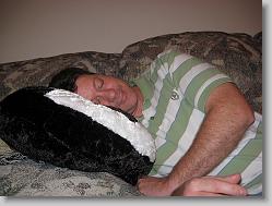 Dad testing out Joshua's new pillow...