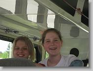 Kathryn and Meredith smiling back at me on the ride. (almost there...)