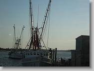 Shrimp boats on the river right before we get to the beach.