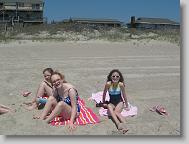 Amanda, Meredith, and Hannah on the beach.