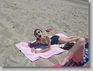 HELP! ITS TOO HOT! THE SUN BURNS! shouts Hannah.