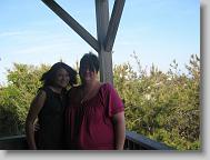 Allee and Ms. Laura (her mom) on the balcony of our house before dinner.