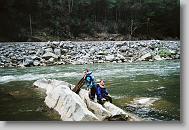 Playing on the river at lunch stop.