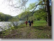 Boys going on a hike down the river path
