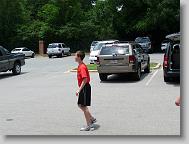 Joshua playing in parking lot prior to departure.