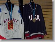 Tuomo Ruutu (Finland, bronze) and 
Tim Gleason (USA, silver)