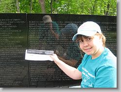 Ciara getting her etching at the Vietnam Veterans Memorial.