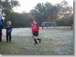 Last game of season.  COLD!  (frosted field).