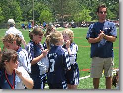 Courage and their championship medals.