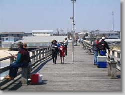 Aliza and Joshua coming up the pier.