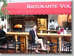 Kay waiting for everyone to show up for dinner at Ristorante Volare.