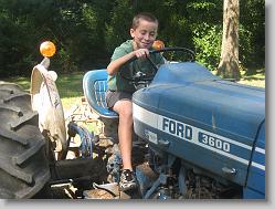 Joshua on the tractor.