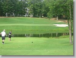 Joshua teeing off (over the water!).