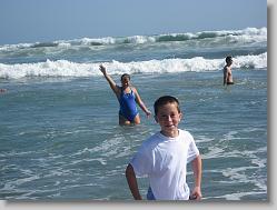 Ciara and Joshua enjoying the waves