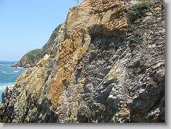 Cliff Diver climbing up the cliffs.
