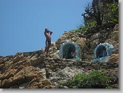 Cliff Diver at top - notice the shrines (they all kissed them before diving).