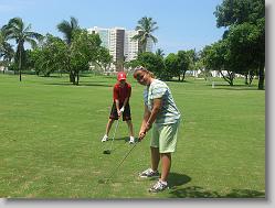 Joshua and Ciara on the golf course.