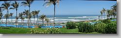 Panoramic photo (4 pictures) of kilometric pool and beach at Mayan Palace.