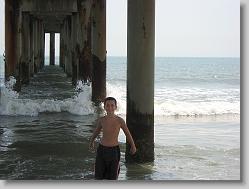 Joshua under St. Augustine beach pier.
