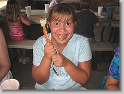 Ciara and her crab leg (at Outback Crabshack, in St. Augustine, FL)