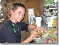 Joshua in crab heave (at Outback Crabshack, in St. Augustine, FL)